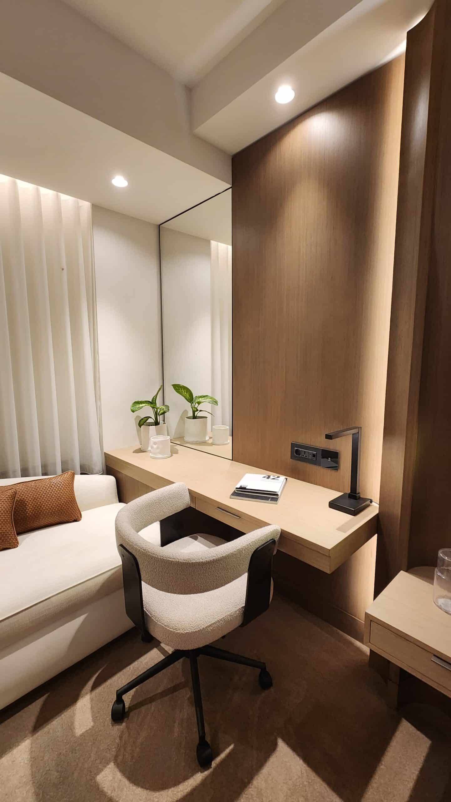 Desk and lounge joinery inside a full-scale prototype hotel guest room