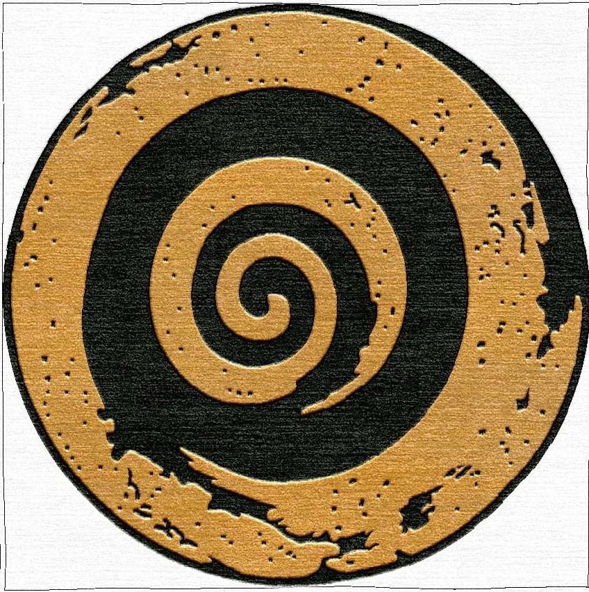 The Golden Spiral rug design: a black and gold wool spiral, hand-woven in Nepal for the Cocoplum x Lila Rugs collaboration