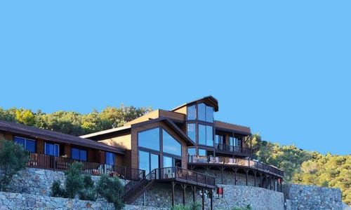 Timber terrace overlooking the hills at Assos Wooden Villa, Çanakkale, Türkiye