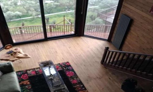 Pine timber interior at Assos Wooden Villa, Çanakkale, Türkiye